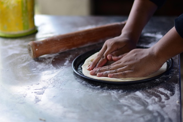 Chef Giuseppe preparing pizza